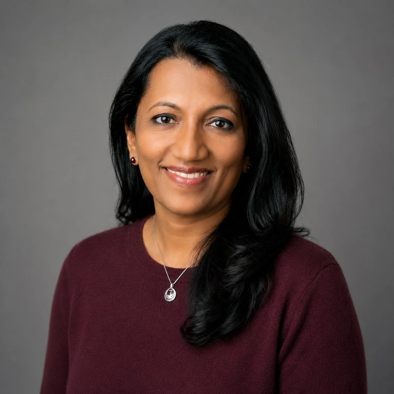 Dr. Cini Mathew John